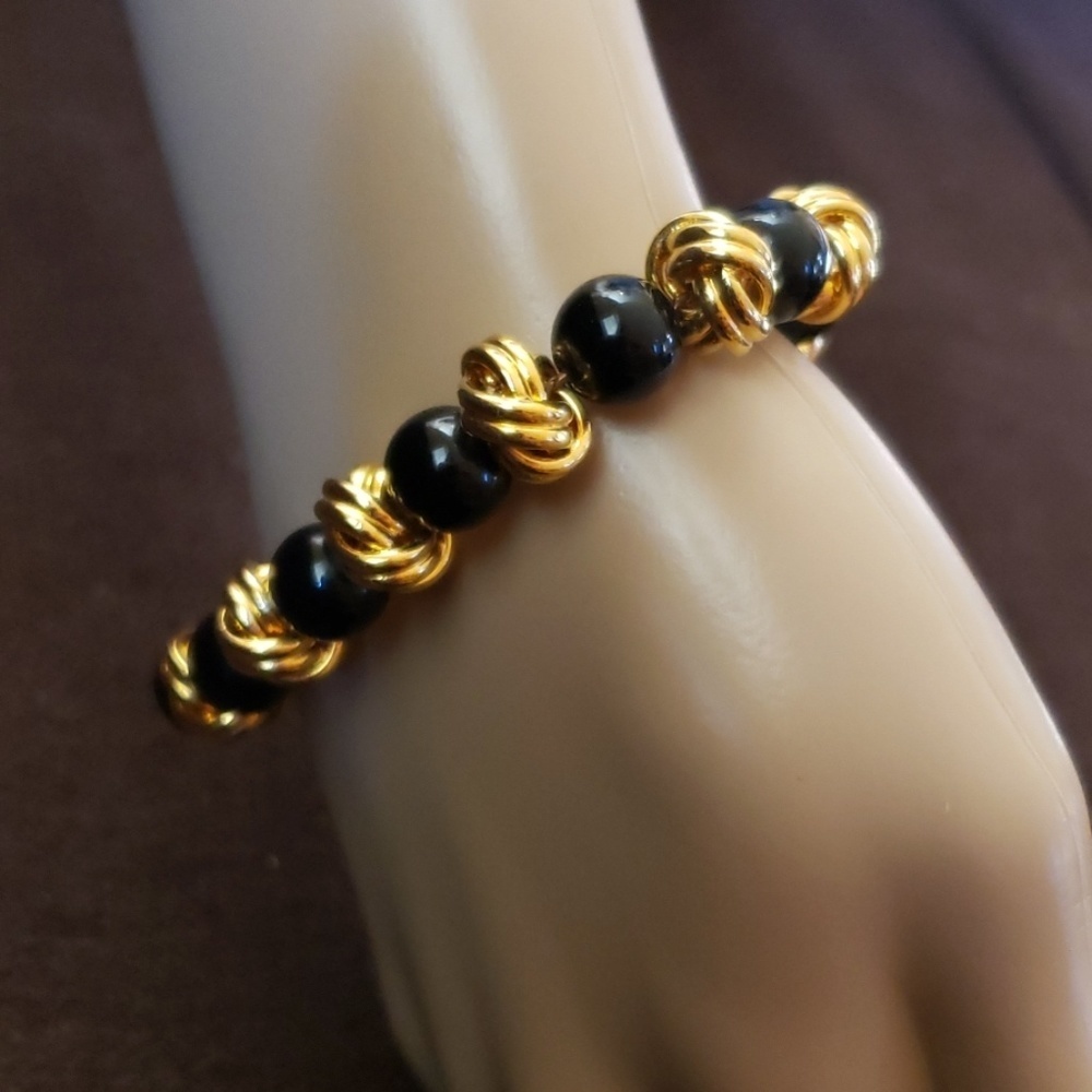 AKNI black onyx and gold bead bracelet